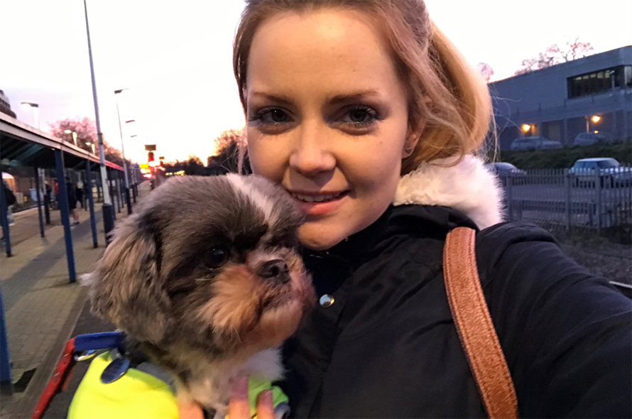 Becky Lodder holding a dog