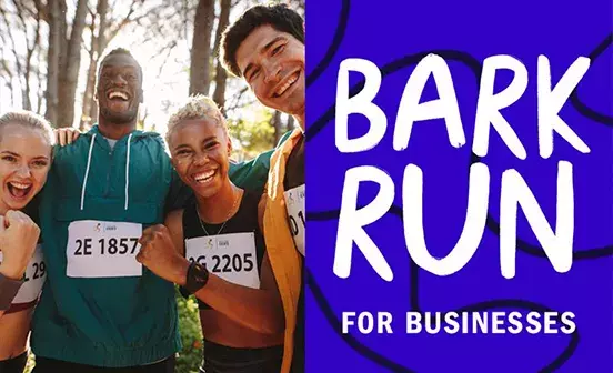 A group of people smiling with text Bark Run for Businesses